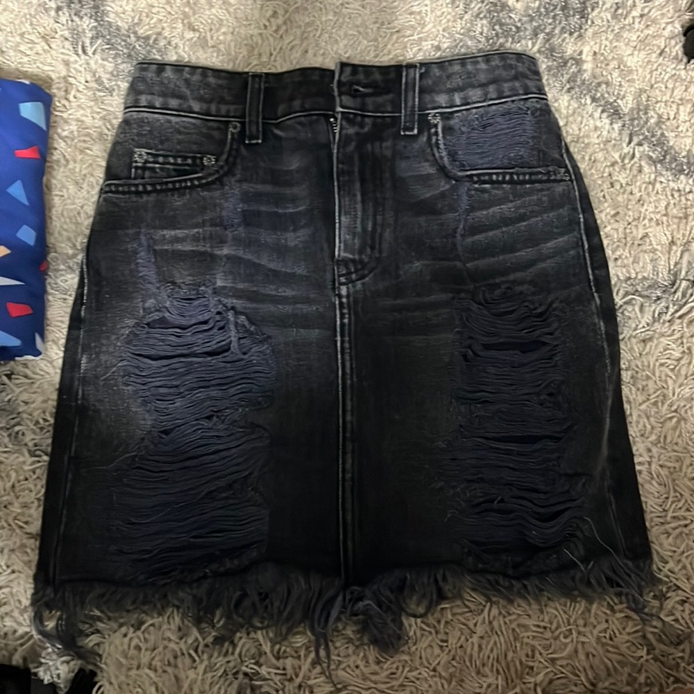 Carmar dark denim skirt with rips down the front